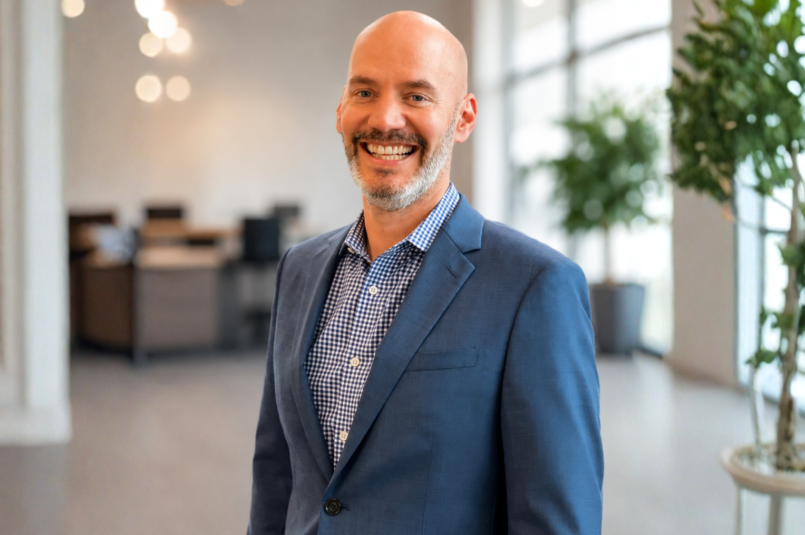 Headshot of Thomas Row, CFO et ECI Group